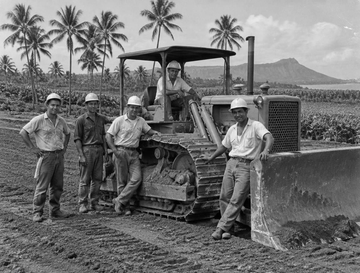 Royal Contracting crew with a crawler bulldozer on an Oʻahu grading site in the 1960s